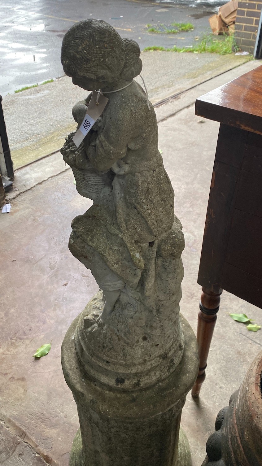 A reconstituted stone garden statue on plinth, overall 109cm